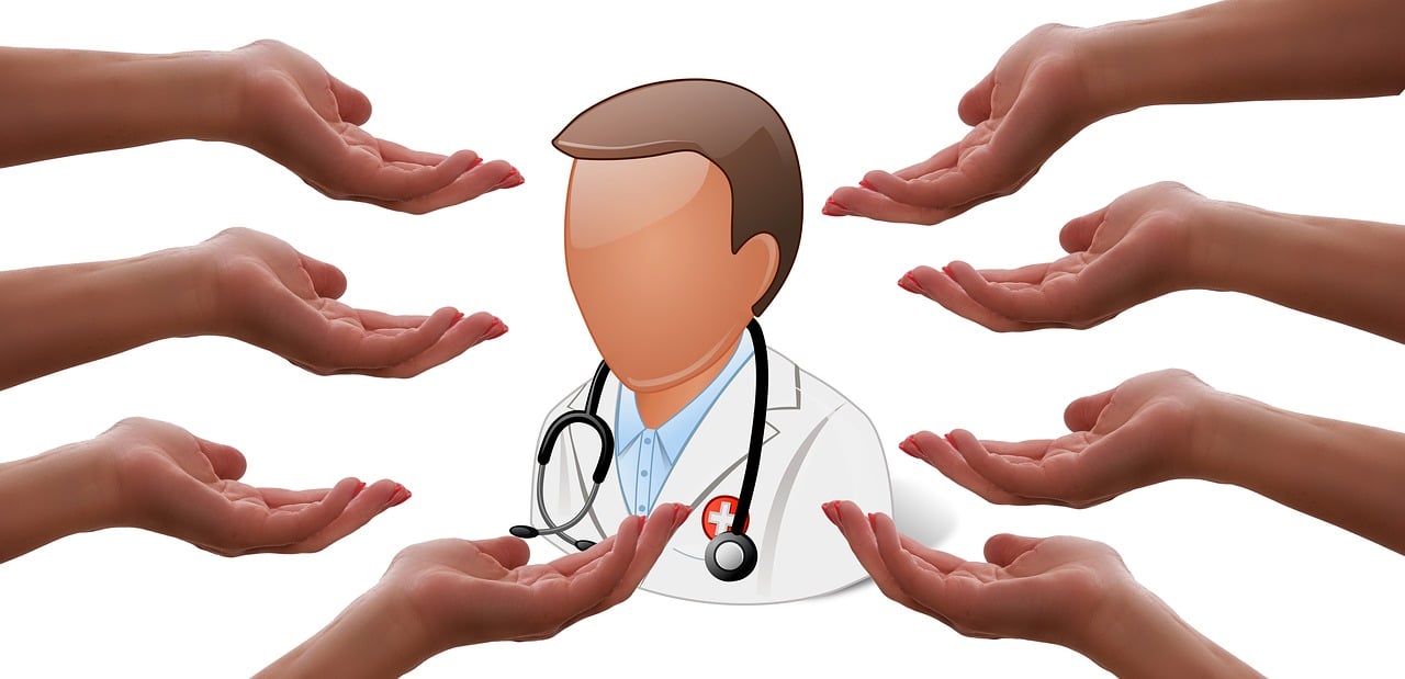 A doctor talking to a patient.